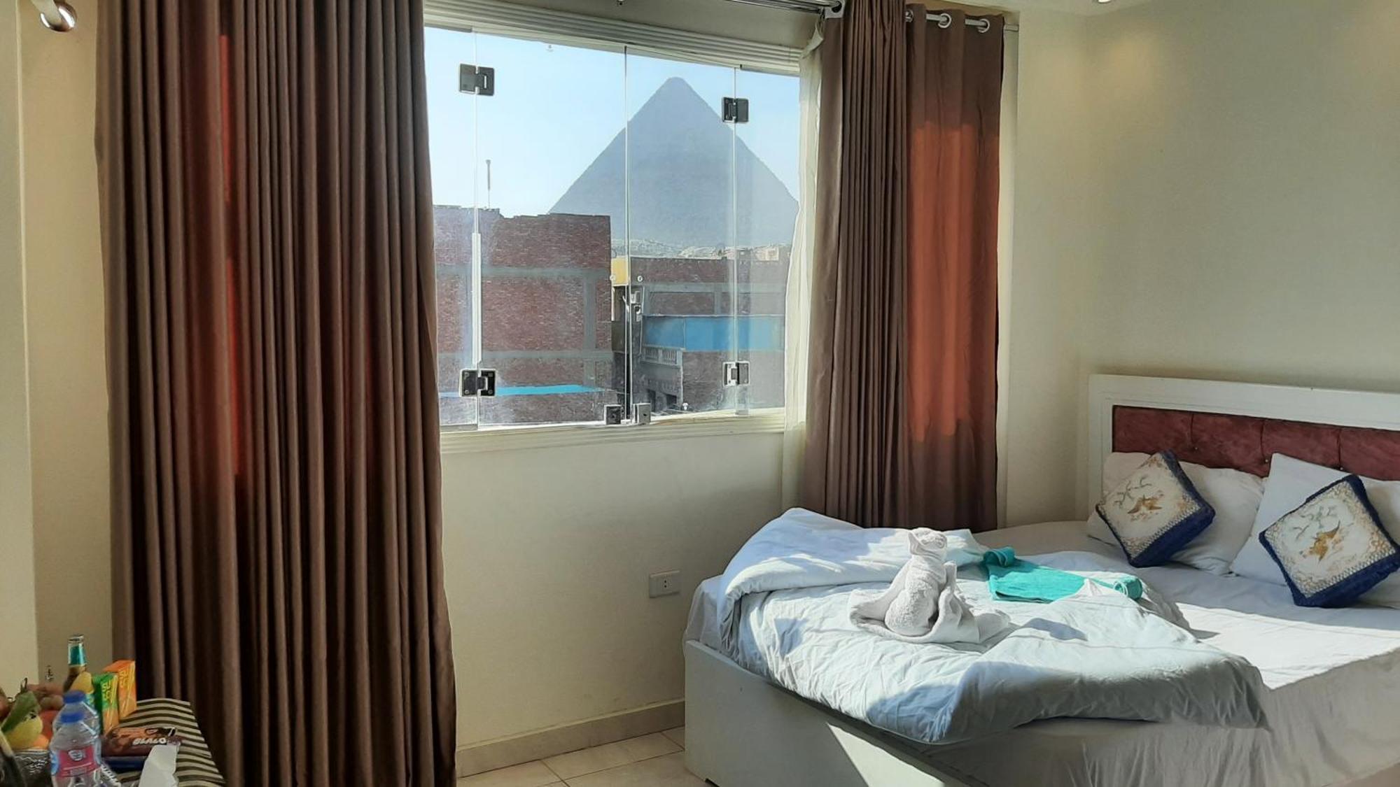 Queen Isis Pyramids View Al Kawm al Akhdar Extérieur photo